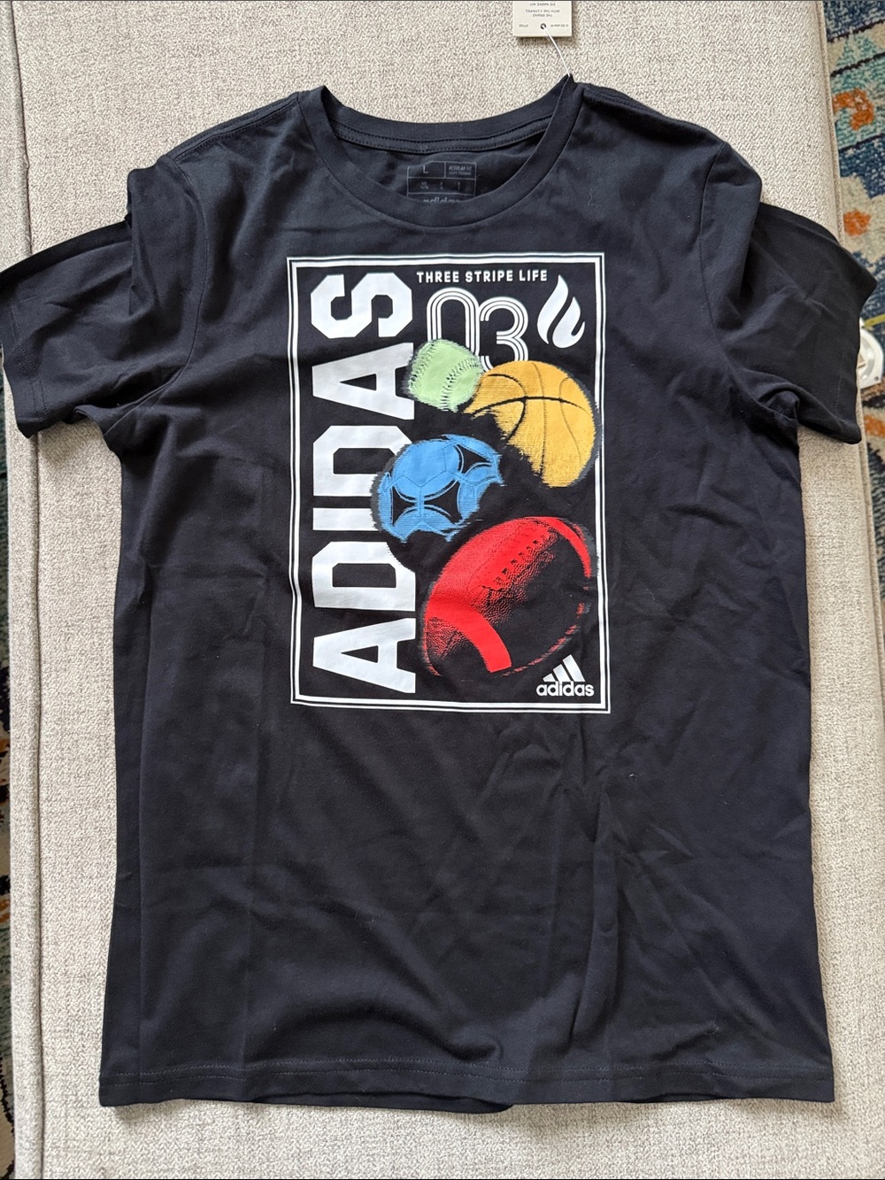 adidas Black Short Sleeve Tee with Colorful Sports Ball Graphic
